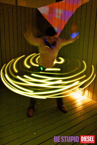 Illustration for article titled Half-Naked Ravers Served Drinks By Glow-in-the-Dark Robot at Gawker HQ